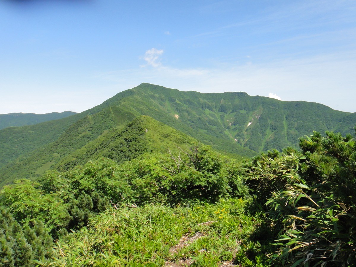Mt. Kariba, the highest peak of southern Hokkaido, with green ridges and lingering snow